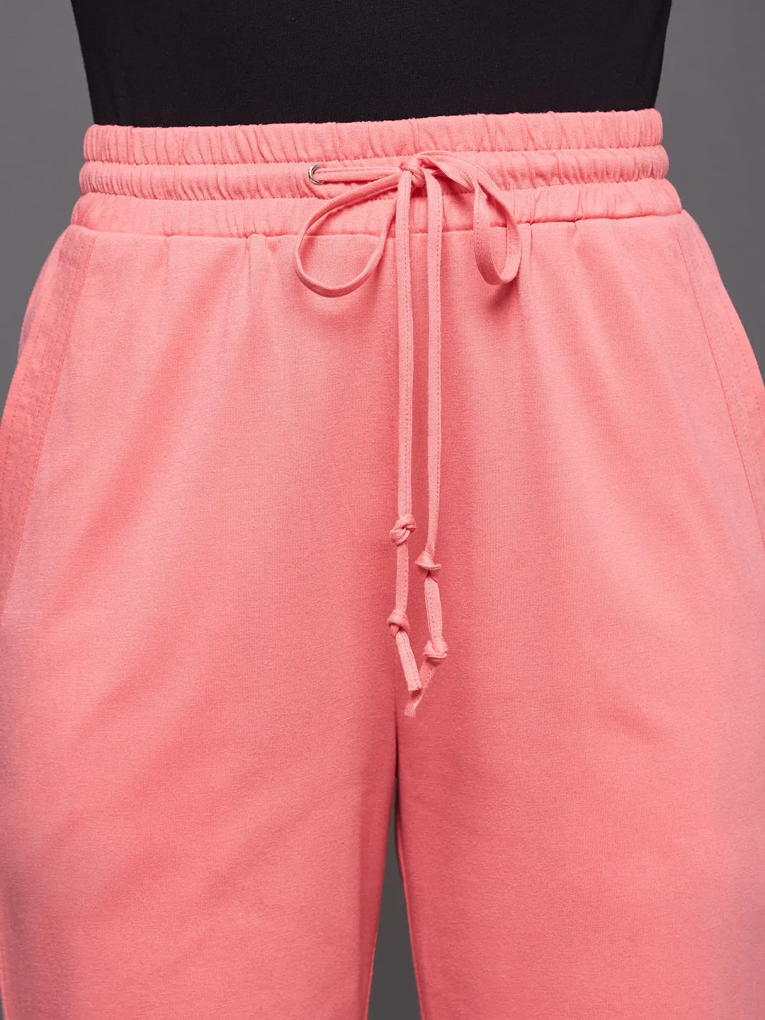 EYELET DRAWSTRING BOTTOM- CORAL