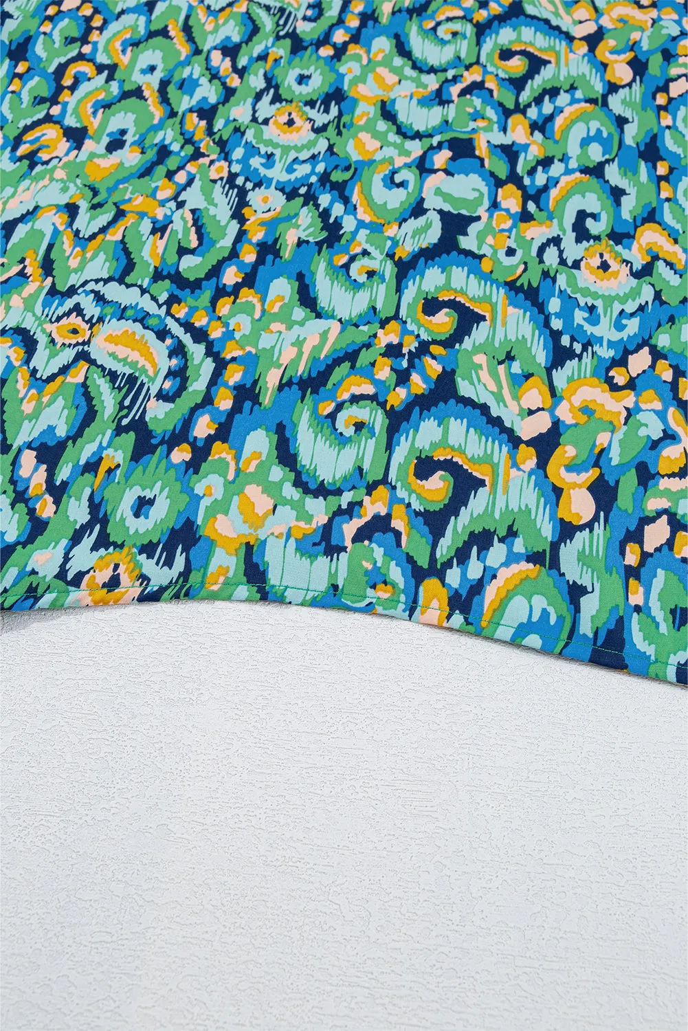 Green Abstract Print V Neck Half Sleeve Loose Fit Tunic Blouse