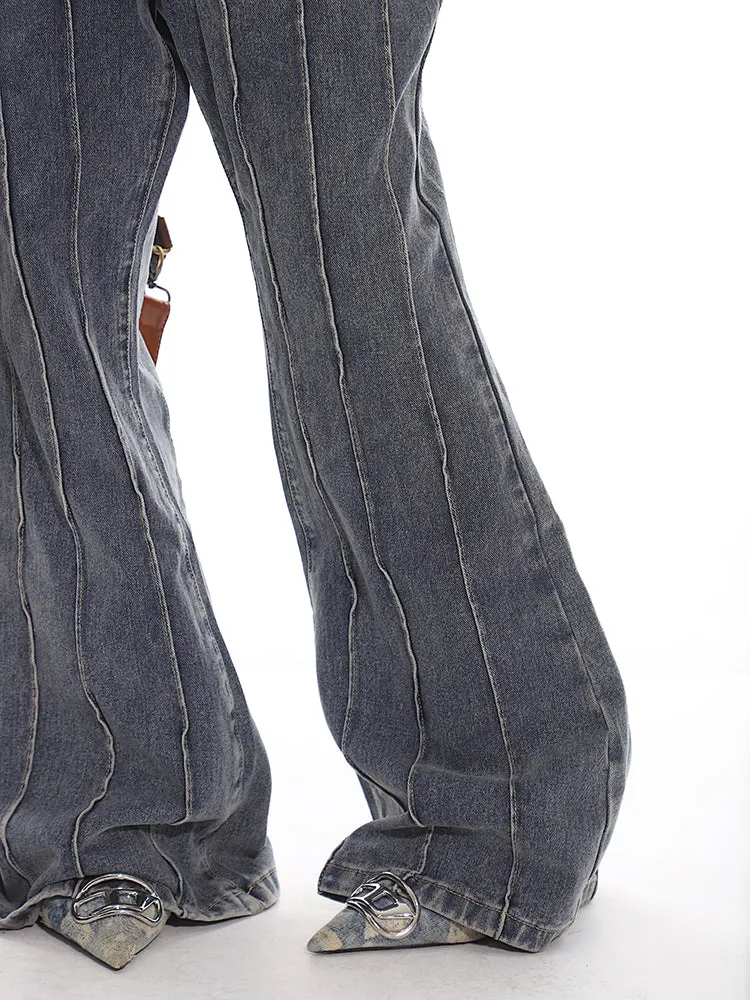 Pleated Exposed Seam Flared Denim Jeans