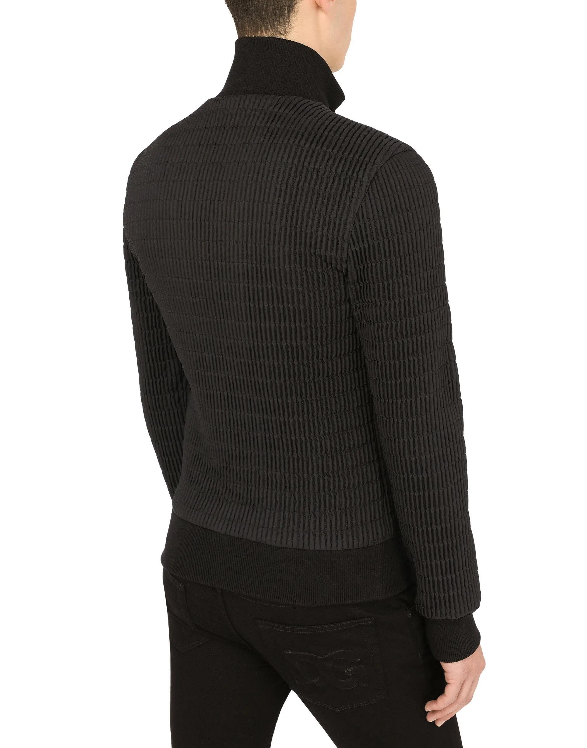 Quilted nylon jacket with branded plate