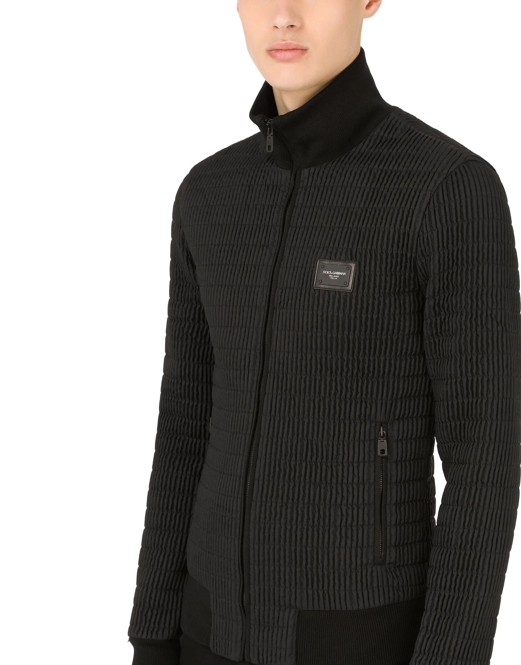 Quilted nylon jacket with branded plate
