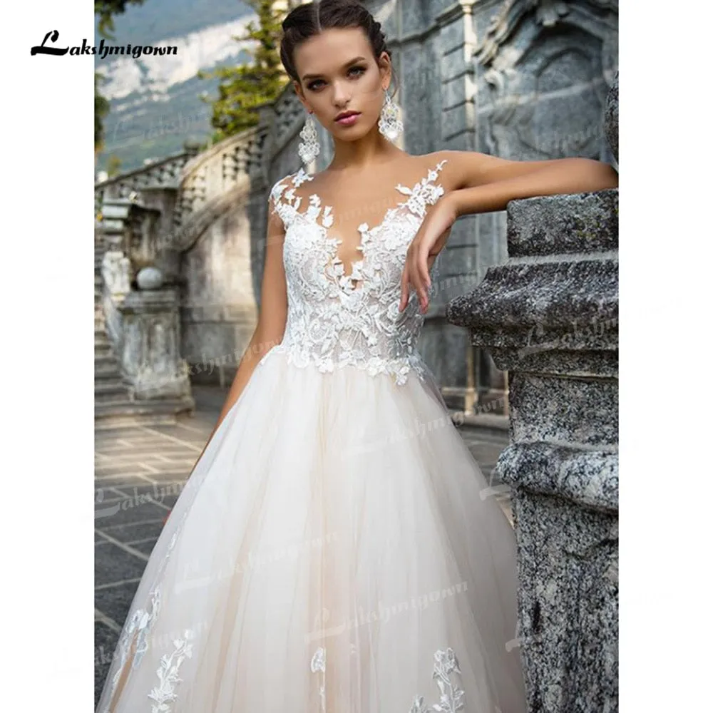 Roycebridal Gorgeous Tulle A-Line Wedding Dresses Illusion Boat Neck Low Open Back Cap Short Sleeve Chapel Train Bride Gowns Appliques Bead